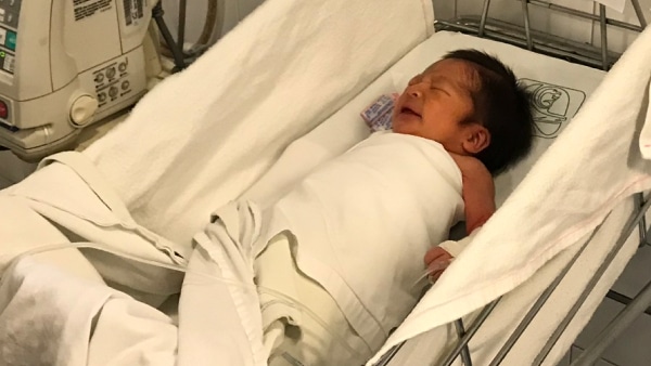 1col-baby-swaddled
